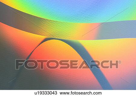 Stock Image - Ribbons on a Rainbow Background. Fotosearch