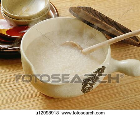 Stock Photo - Rice cooked in pan. Fotosearch