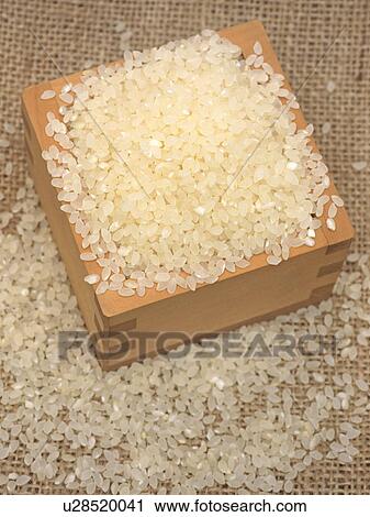 Stock Image - Rice in a bamboo box. Fotosearch
