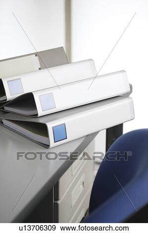 Ring binders on a desk View Large Photo Image Stock Photo - Ring binders on a desk. Fotosearch