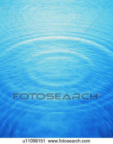 Stock Image - Rippled water surface. Fotosearch
