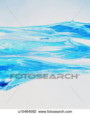 Stock Image - Rippled water surface. Fotosearch