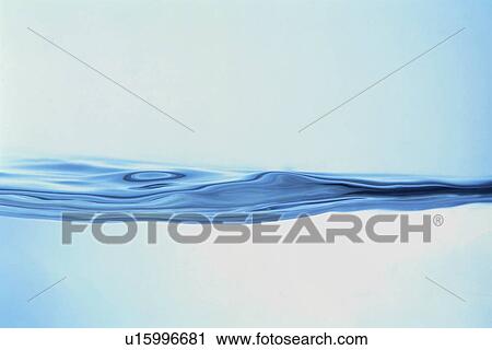 Stock Image - Rippled water surface. Fotosearch