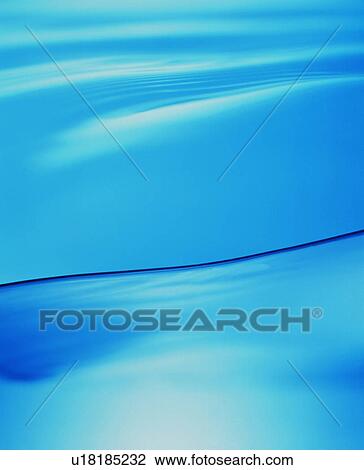 Stock Image - Rippled water surface. Fotosearch