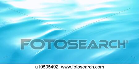 Stock Image - Rippled water surface. Fotosearch