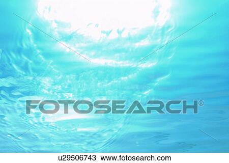 Stock Image - Rippled water surface. Fotosearch