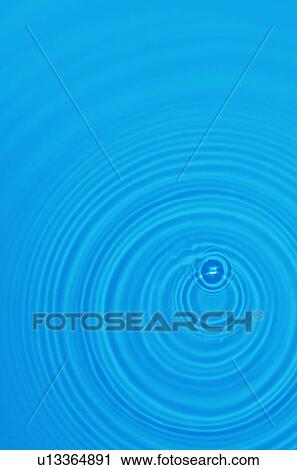 Stock Image - Rippled water with blue background. Fotosearch