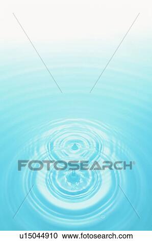 Stock Image - Rippled water with blue background. Fotosearch