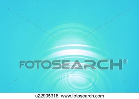 Stock Photograph - Rippled water with blue background. Fotosearch