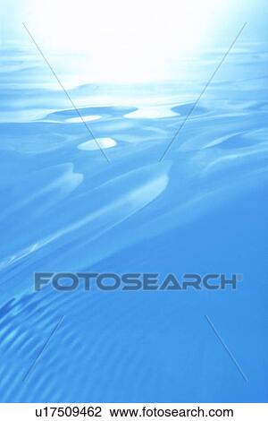 Stock Image - Ripples on water surface. Fotosearch