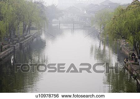 Stock Photograph - River in the morning, China. Fotosearch