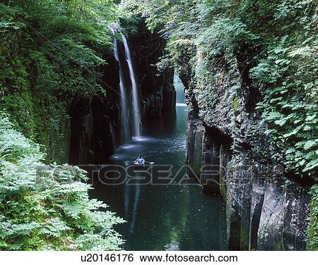 Stock Photograph - River rafting in Takachiho gorge, Miyazaki prefecture, Japan. Fotosearch