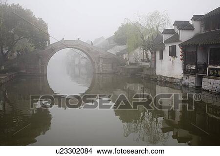 Riverside in the morning fog, Xi Tang, China View Large Photo Image Picture - Riverside in the morning fog, Xi Tang, China. Fotosearch