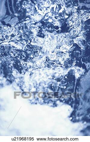 Stock Photography - Running water, close up. Fotosearch