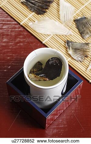 Sake with fin of balloonfish View Large Photo Image Stock Image - Sake with fin of balloonfish. Fotosearch