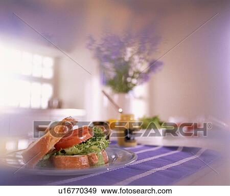 Stock Photo - Salad sandwich on table. Fotosearch