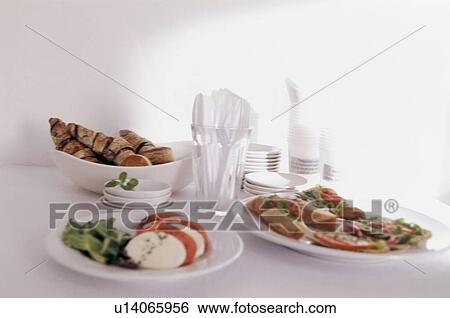 Salad sandwiches and croissants with plates and cutlery View Large Photo Image Stock Photograph - Salad sandwiches and croissants with plates and cutlery. Fotosearch