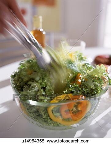 Salad serving with tongs View Large Photo Image Stock Photography - Salad serving with tongs. Fotosearch