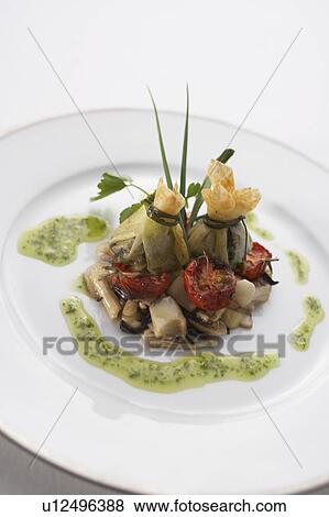 Sauteed escargot with mushrooms View Large Photo Image Stock Photo - Sauteed escargot with mushrooms. Fotosearch