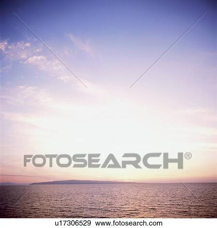 Stock Photo - Sea in sunset. Fotosearch