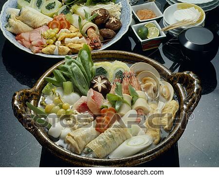 Stock Photo - Seafood and vegetables cooked in crock pot. Fotosearch