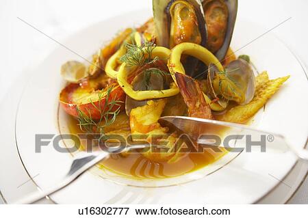 Stock Photo - Seafood bouillabaisse. Fotosearch