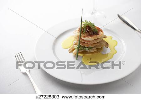 Seafood stack with sauce View Large Photo Image Stock Image - Seafood stack with sauce. Fotosearch