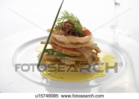 Stock Photography - Seafood stack with sauce. Fotosearch