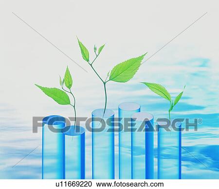 Stock Image - Seedlings sprouting from transparent tubes. Fotosearch