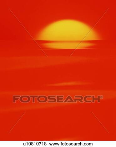 Setting sun in a bright red sky View Large Photo Image Stock Photo - Setting sun in a bright red sky. Fotosearch