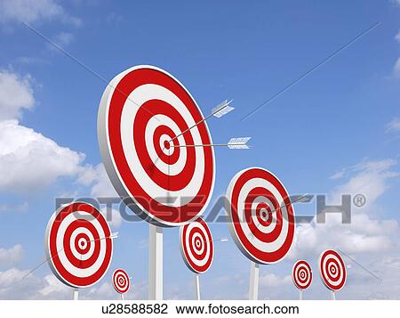 Stock Image - Seven bull's eye with sky in background. Fotosearch