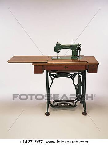 Stock Photo - Sewing machine, white background. Fotosearch