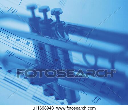 Stock Image - Sheet music and trumpet. Fotosearch