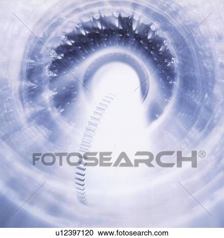 Stock Image - Silver gear going down the drain. Fotosearch