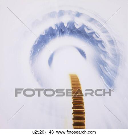 Stock Image - Silver gear going down the drain. Fotosearch