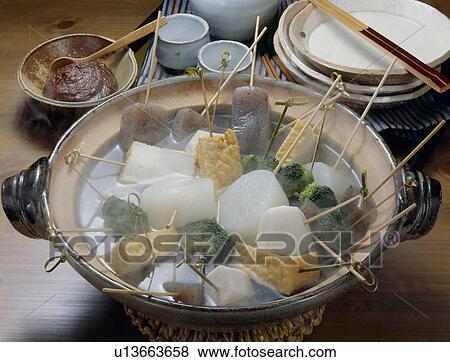 Stock Photo - Skewered foods cooked in crock pot. Fotosearch