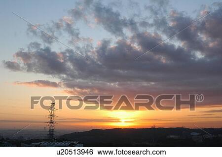 Stock Photograph - Sky at sunrise, Tokyo prefecture, Japan. Fotosearch