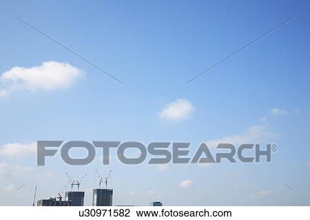 Stock Image - Skyline of buildings in construction, Kawasaki City, Kanagawa Prefecture, Honshu, Japan. Fotosearch