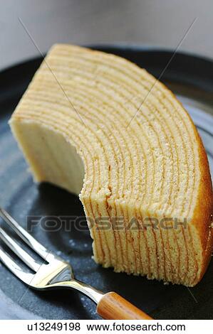 Slice of baumkuchen, close up View Large Photo Image Stock Photo - Slice of baumkuchen, close up. Fotosearch