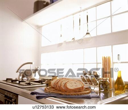 Sliced bread on kitchen counter View Large Photo Image Stock Image - Sliced bread on kitchen counter. Fotosearch