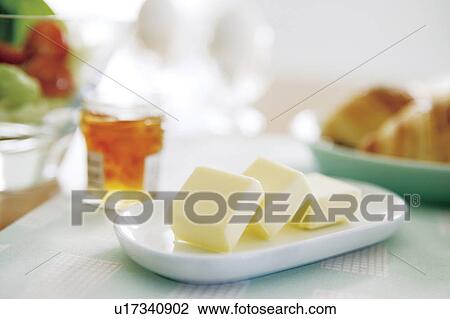 Sliced butter on plate View Large Photo Image Stock Image - Sliced butter on plate. Fotosearch