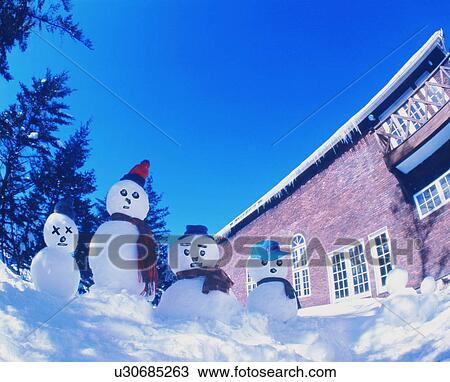 Snowman family outside in the yard View Large Photo Image Stock Image - Snowman family outside in the yard. Fotosearch