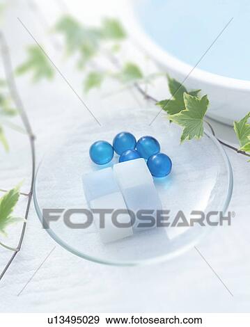 Soap and bath beads on soap dish, close up View Large Photo Image Stock Photo - Soap and bath beads on soap dish, close up. Fotosearch