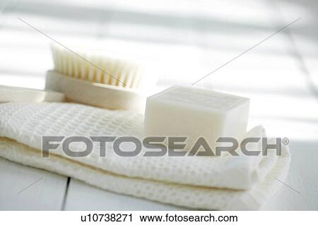 Soap and brush on towel View Large Photo Image Stock Image - Soap and brush on towel. Fotosearch