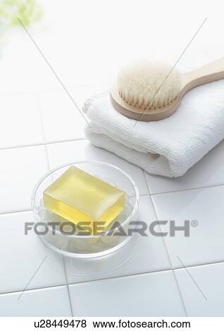 Soap and brush on towel View Large Photo Image Stock Photo - Soap and brush on towel. Fotosearch