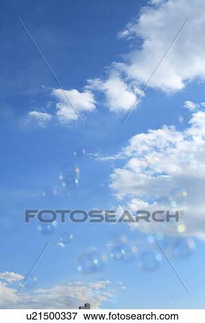 Stock Photo - Soap bubbles in sky. Fotosearch