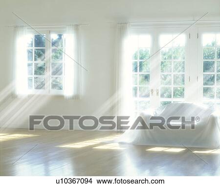 Picture - Sofa covered with sheet in living room, computer graphic. Fotosearch