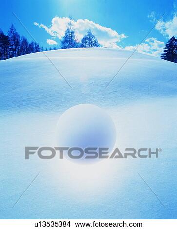 Sphere floating over snowy landscape View Large Photo Image Picture - Sphere floating over snowy landscape. Fotosearch