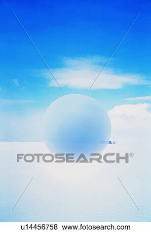 Sphere floating over snowy landscape View Large Photo Image Stock Photo - Sphere floating over snowy landscape. Fotosearch