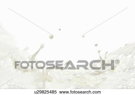 Stock Photography - Splashing Milk on a White Background. Fotosearch